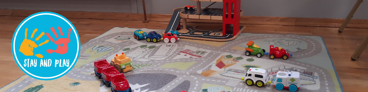 Stay and Play logo with image of car playmat and toy cars